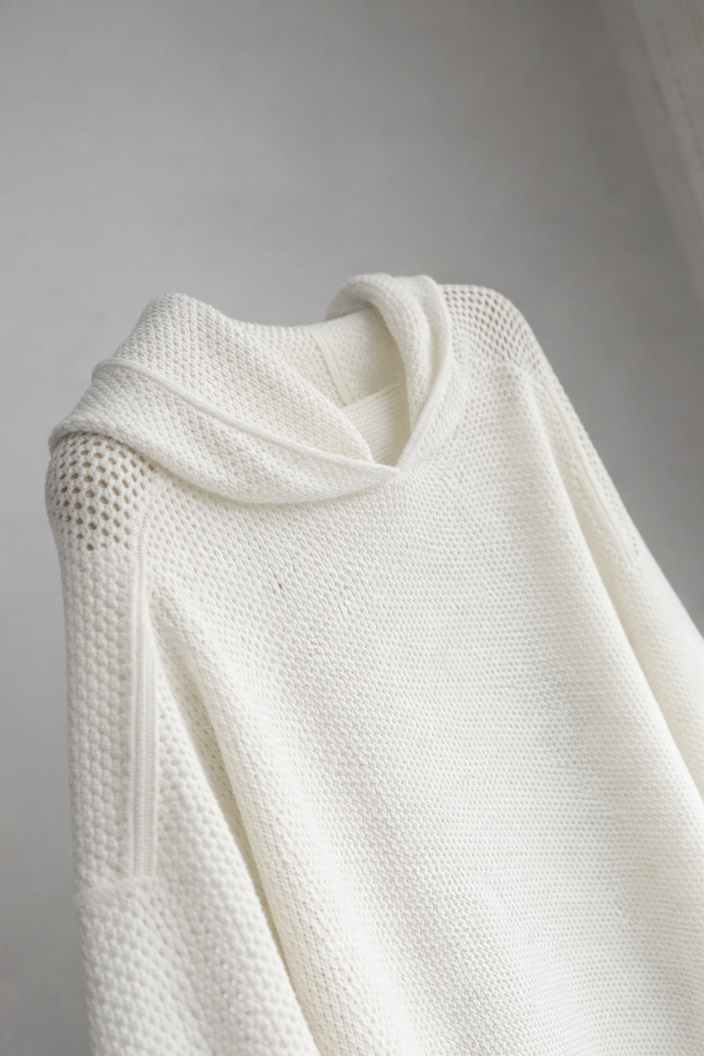 HOLLOW OUT HOODED KNITWEAR
