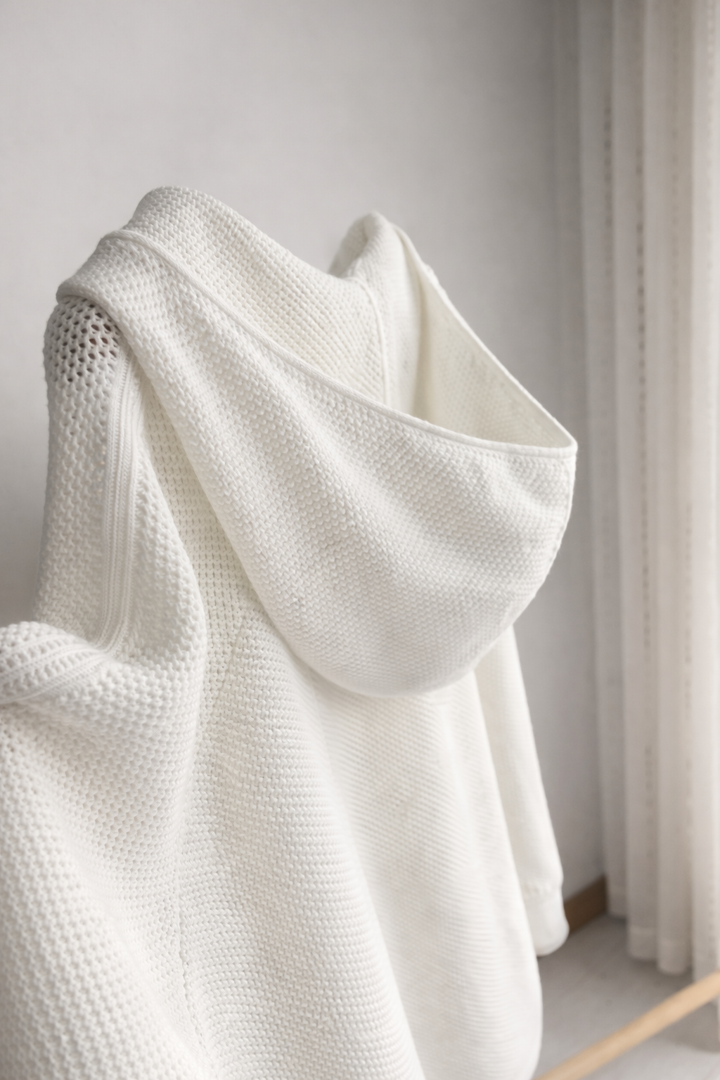 HOLLOW OUT HOODED KNITWEAR